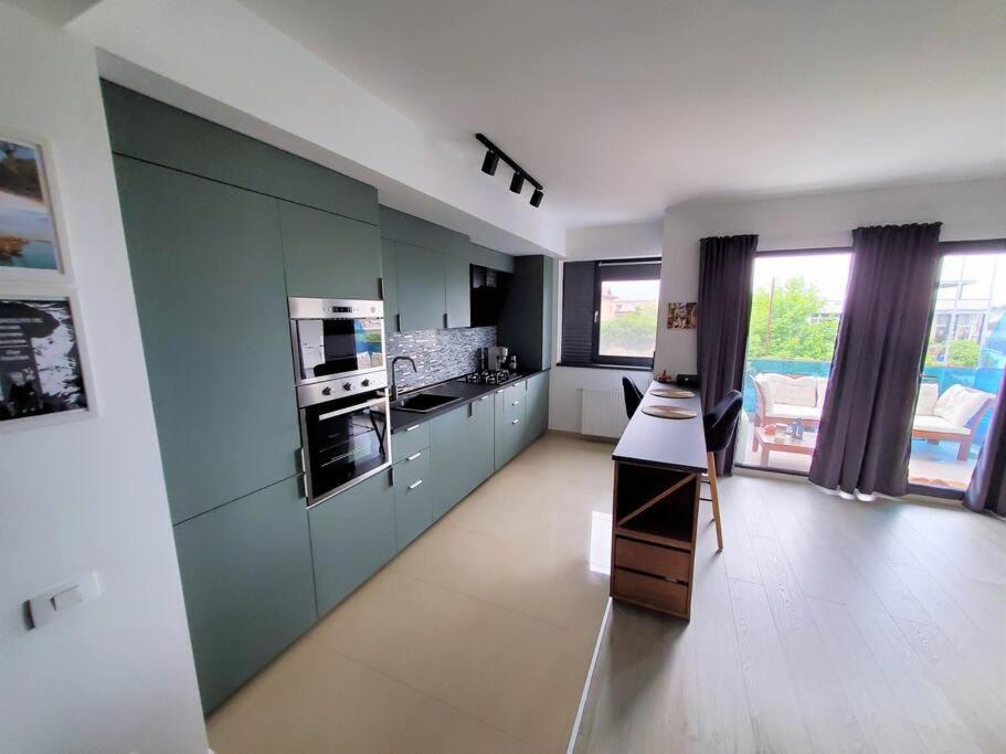 Sunny 1BR Apt in Central Pipera - 99